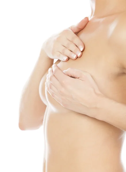 stock image Breast cancer, woman holding her breast