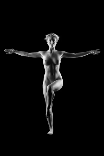 stock image Young naked women on black background