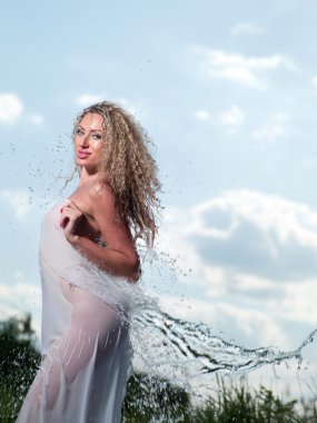 Woman in wet clothes