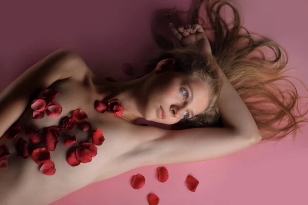 stock image Beautiful girl in rose petal