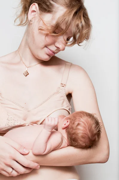 stock image Baby breastfeeding