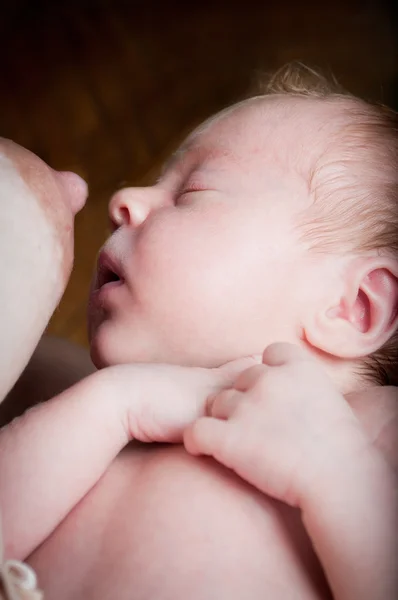 stock image Baby breastfeeding