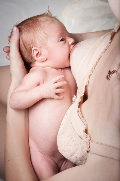 stock image Baby breastfeeding