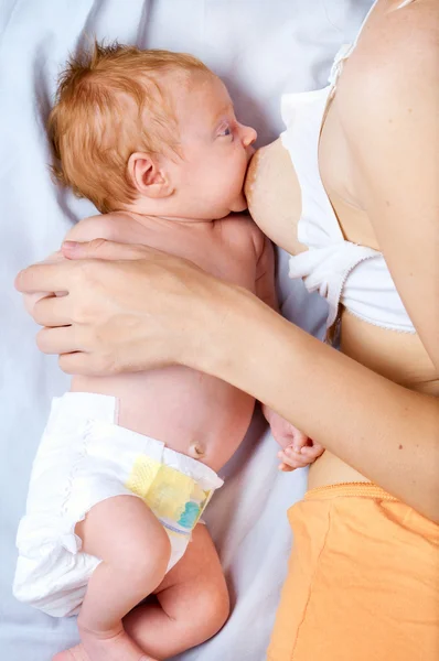 Stock image Baby breastfeeding