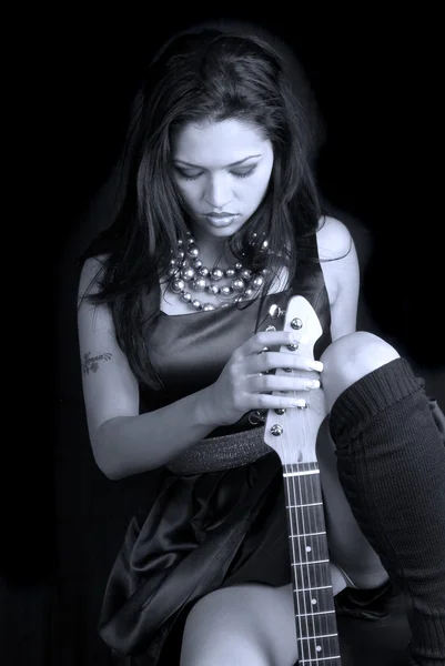 stock image Hispanic female rocker with guitar