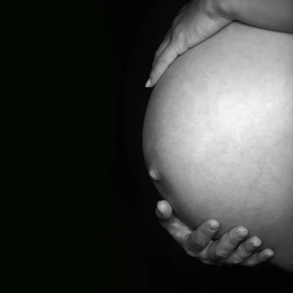 La mujer embarazada en el noveno mes —  Fotos de Stock