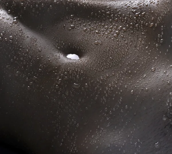 stock image Belly of guy with drops